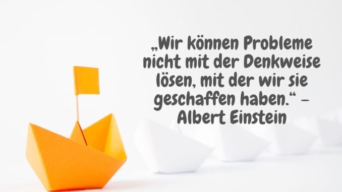Papierschiffchen mit Motivationsspuch: „Wir können Probleme nicht mit der Denkweise lösen, mit der wir sie geschaffen haben.“ – Albert Einstein - Warum sind Motivationssprüche so beliebt?